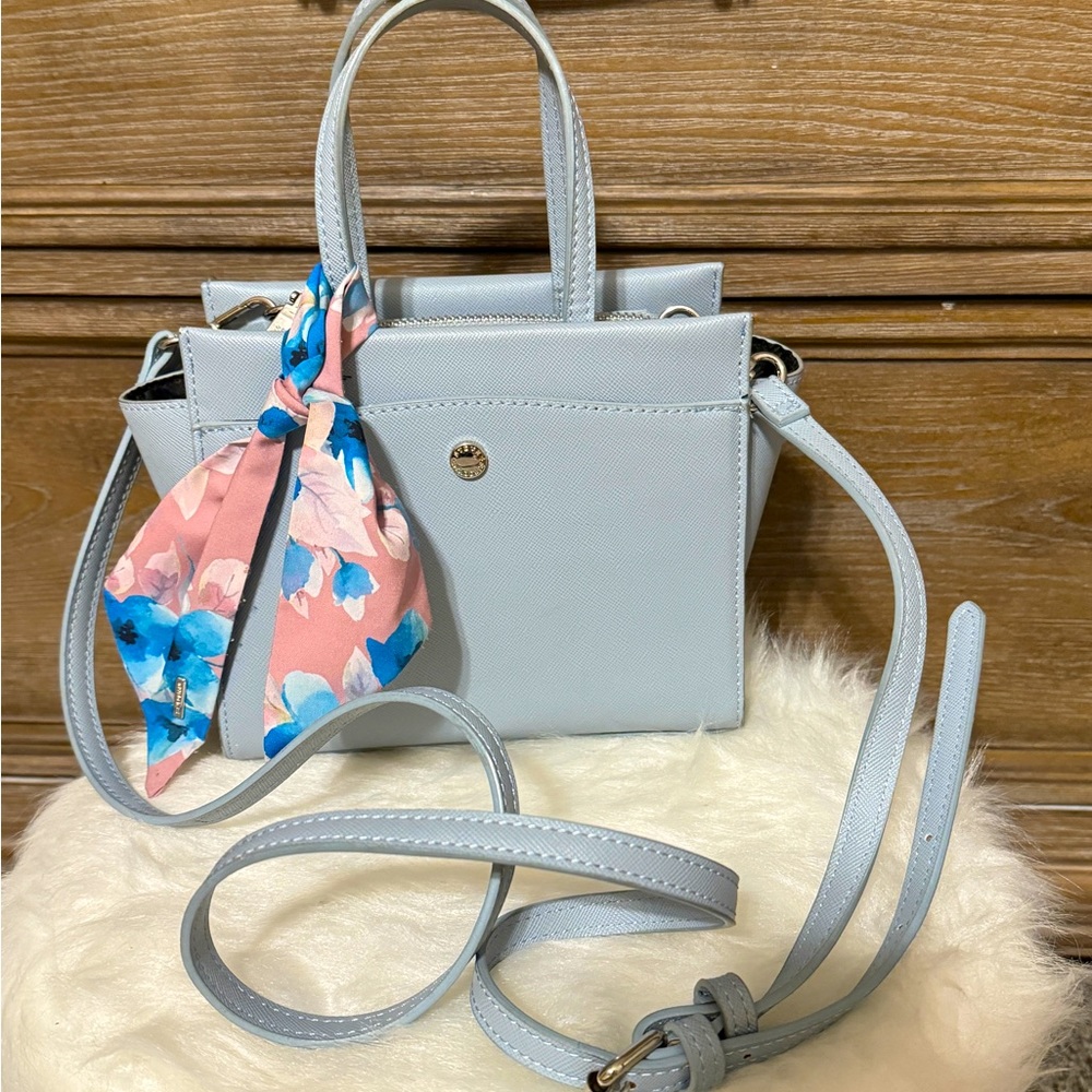 New blue leather bag.
